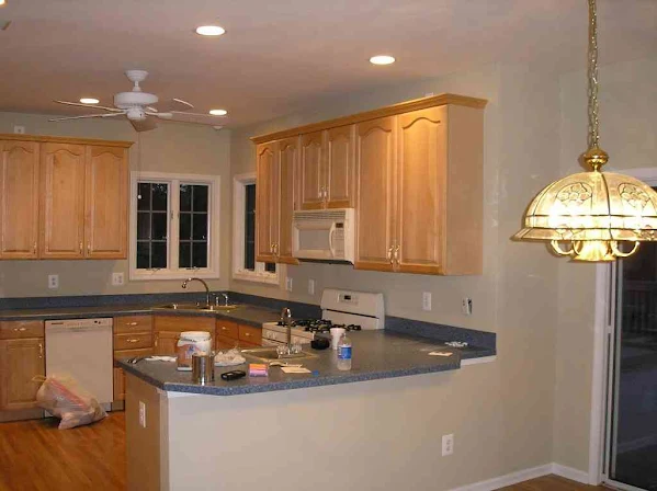 Freshly plastered kitchen walls and ceiling in a London home