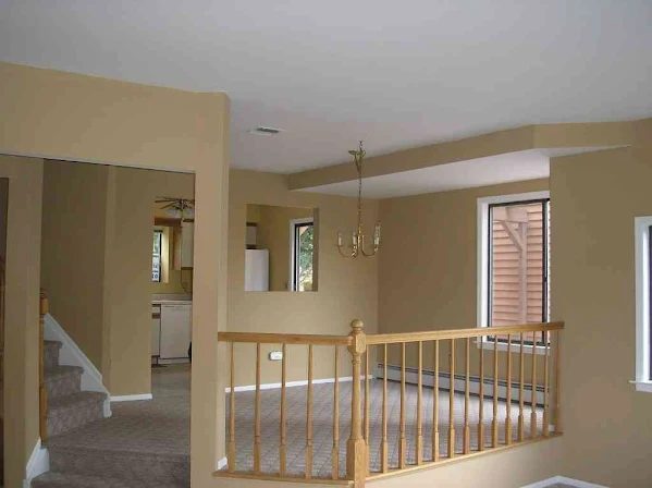 Plastered landing and hallway in a multi-storey residential property